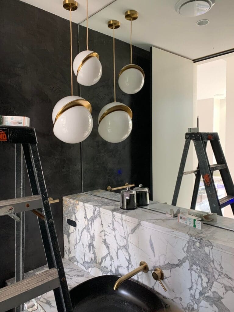 Contemporary bathroom undergoing repair and maintenance work